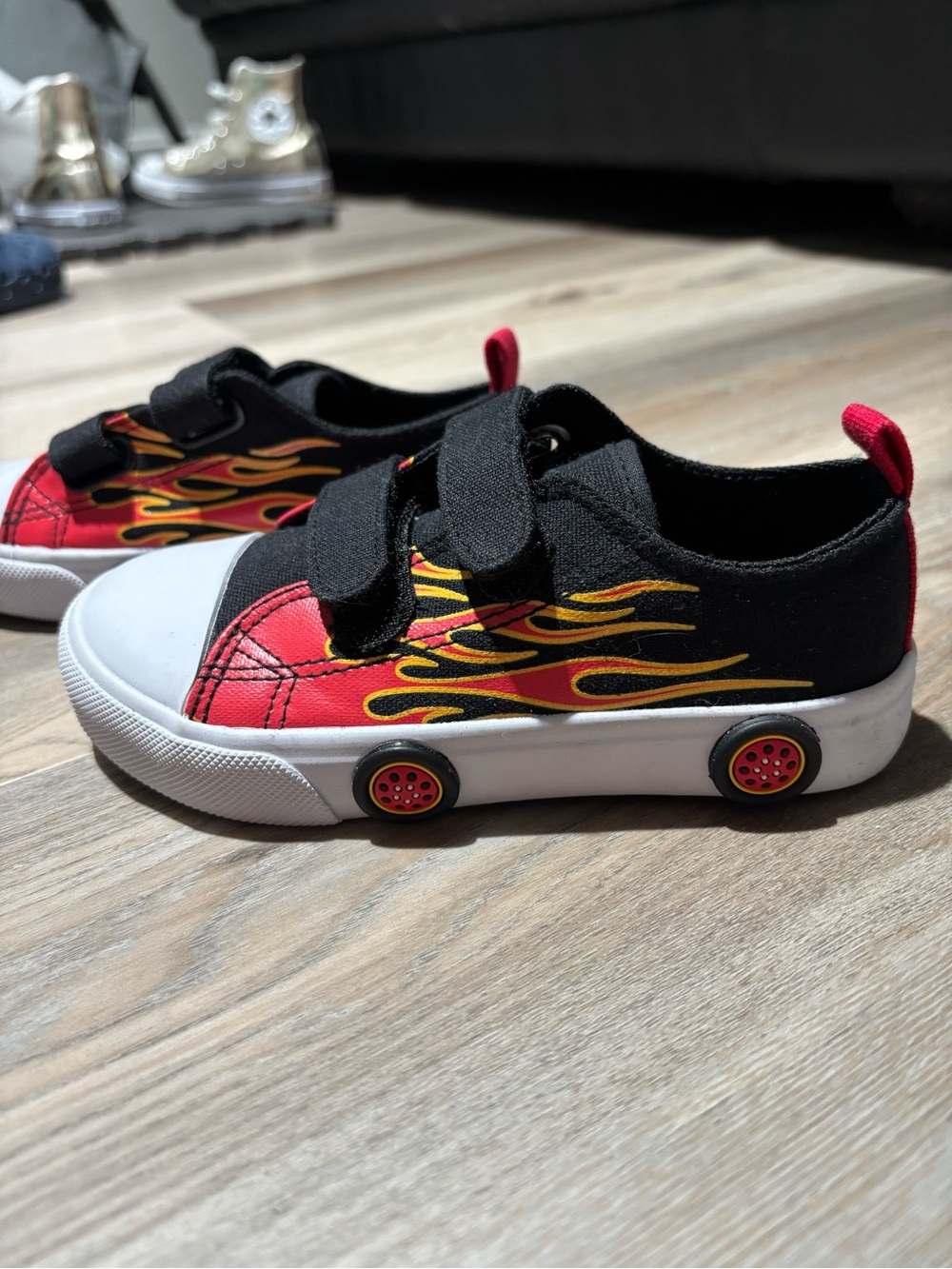 Tommy Bahama Kids Black Sneakers with Red & Yellow Flame Accents